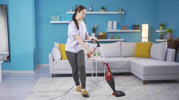 Asian young woman cleaning is dancing. video