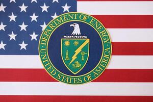 KYIV, UKRAINE - MARCH 9, 2024 US Department of Energy seal on United States of America flag photo