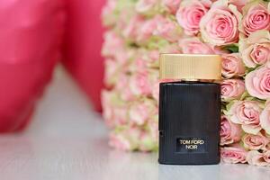 KHARKIV, UKRAINE - JANUARY 2, 2021 Perfume bottle of Noir by Tom Ford, a luxury fashion house founded by designer Tom Ford photo