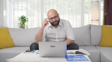 Home office worker man focused on thinking. video