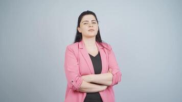 Business woman with arms folded and laughing at camera. video