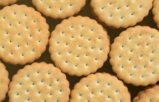 Detailed picture of round sandwich cookies with coconut filling. Background image of a close-up of several treats for tea photo