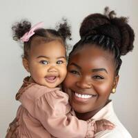 Mother holding her happy toddler suitable for family-themed content and advertising photo