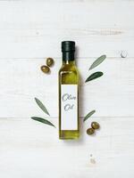 Olive oil glass bottle mock up, top view photo