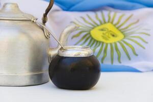 A mate and a kettle with the Argentine flag photo