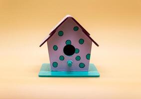 houses for birds made of wood and hand painted photo