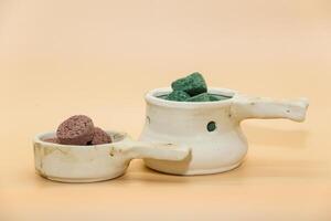 incense burners and variety of aromatic smoke bombs photo