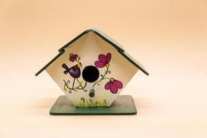 houses for birds made of wood and hand painted photo