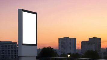 Portrait billboard white blank for outdoor advertising on urban at sunset photo