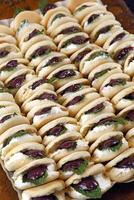 Curd canapes with Arabic bread and olives photo