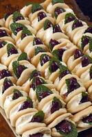 Curd canapes with Arabic bread and olives photo