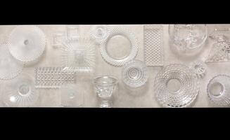 glasses, platters, bowls and kitchen objects seen from above on the table photo