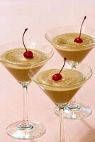 chocolate mousse with cherry in a glass photo