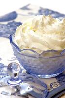 whipped cream in blue bowl photo