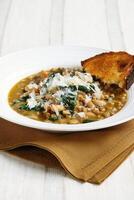broad bean soup with spinach photo