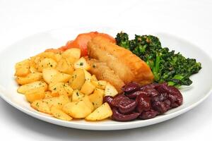 roast cod with potatoes, broccoli and black olives photo