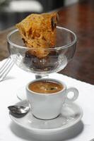 espresso with chocolate and caramel ice cream on the table photo