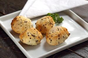 cheese bread on the plate, a Brazilian classic photo