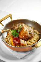 Maria Isabel chicken with rice, bacon, sausage and fried cassava photo