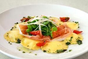 cheese ravioli with Parma ham photo