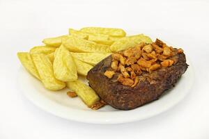 Filet do Moraes, grilled tall fillet with broccoli and fried garlic photo