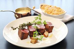 Rump tip with bernaise sauce on plate photo