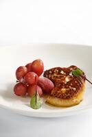 foie gras with chilled grapes photo