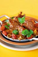 goat stew, stewed with meat and tomato sauce typical of northeastern Brazil photo