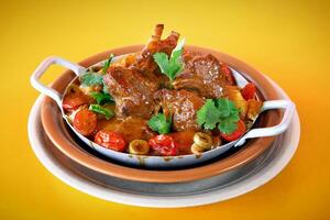 goat stew, stewed with meat and tomato sauce typical of northeastern Brazil photo