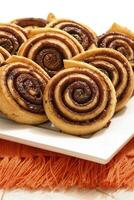 artisanal cinnamon buns on tray photo
