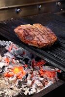 Florentine steak on the grill photo