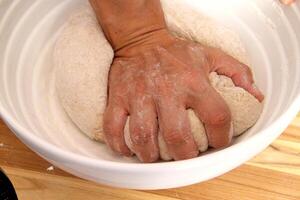 step by step of homemade bread with your hands photo