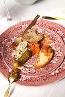 tasting home-made bread with sauces and pickles photo
