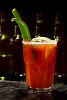 Bloody Mary, classic drink with tomato juice, vodka, lemon juice and pepper photo