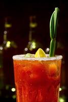 Bloody Mary, classic drink with tomato juice, vodka, lemon juice and pepper photo