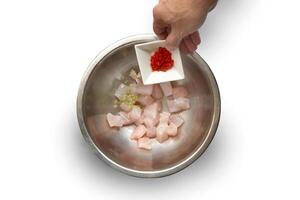 step-by-step guide to Ceviche, a classic Peruvian dish with raw fish, tiger milk sauce, lemon, pepper and red onions photo
