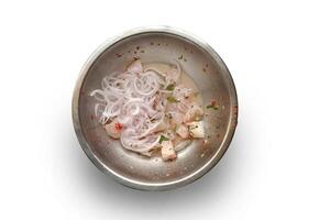 step-by-step guide to Ceviche, a classic Peruvian dish with raw fish, tiger milk sauce, lemon, pepper and red onions photo