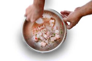 step-by-step guide to Ceviche, a classic Peruvian dish with raw fish, tiger milk sauce, lemon, pepper and red onions photo