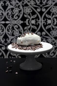 white chocolate ice cream with cocoa nibs photo