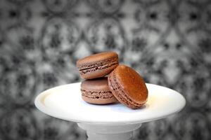 Chocolate macaron with 70 percent cocoa photo