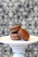 Chocolate macaron with 70 percent cocoa photo