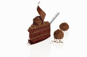 chocolate cake with chocolate cream filling and brigadeiro photo