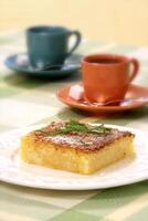 Queijadinha, type of cake with Brazilian cheese and coffee photo