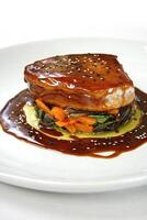 pork loin with vegetables and oriental sauce photo