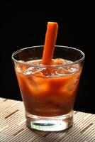Bloody Mary, classic drink with tomato juice, lemon juice, pepper sauce and vodka photo