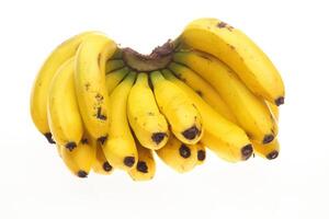 dwarf banana in bunches and separated, with skin and without photo