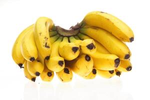 dwarf banana in bunches and separated, with skin and without photo