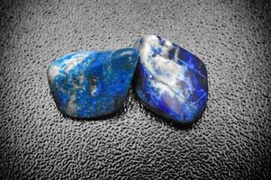lapis lazuli, brazilian gemstone on dark background photo