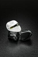 white quartz and green tourmaline, Brazilian gemstone on dark background photo