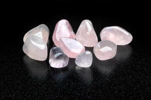 rose quartz, brazilian gemstone on dark background photo